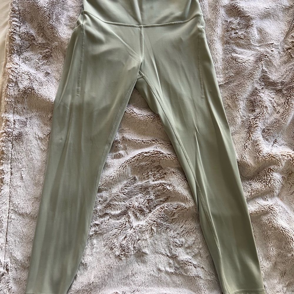 Lululemon High-Rise Wunder Train Leggings with Side Pockets in Jade Grey 25”